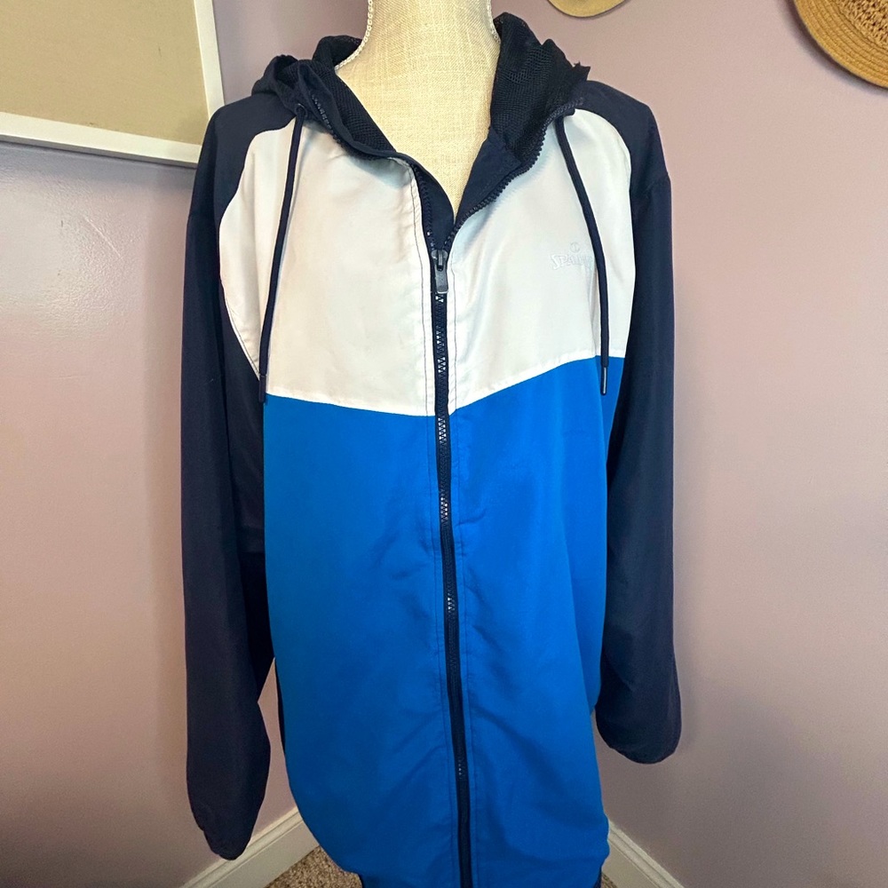 Spalding XXL men’s lightweight jacket.  Navy, white & royal blue colors w/hood.